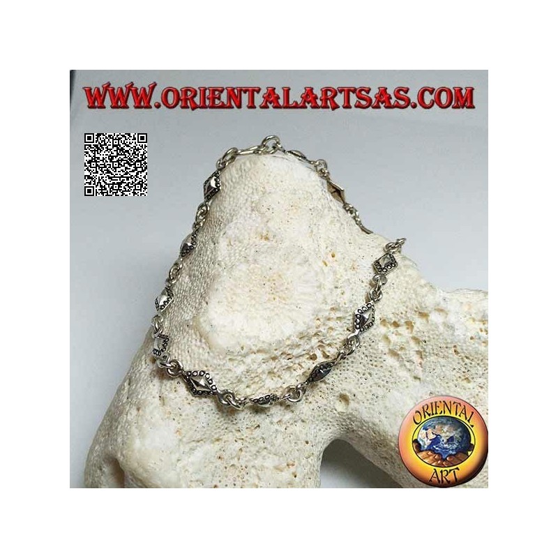 Bracelet en argent tendre avec des plaques rhomboïdes aux contours pointillés