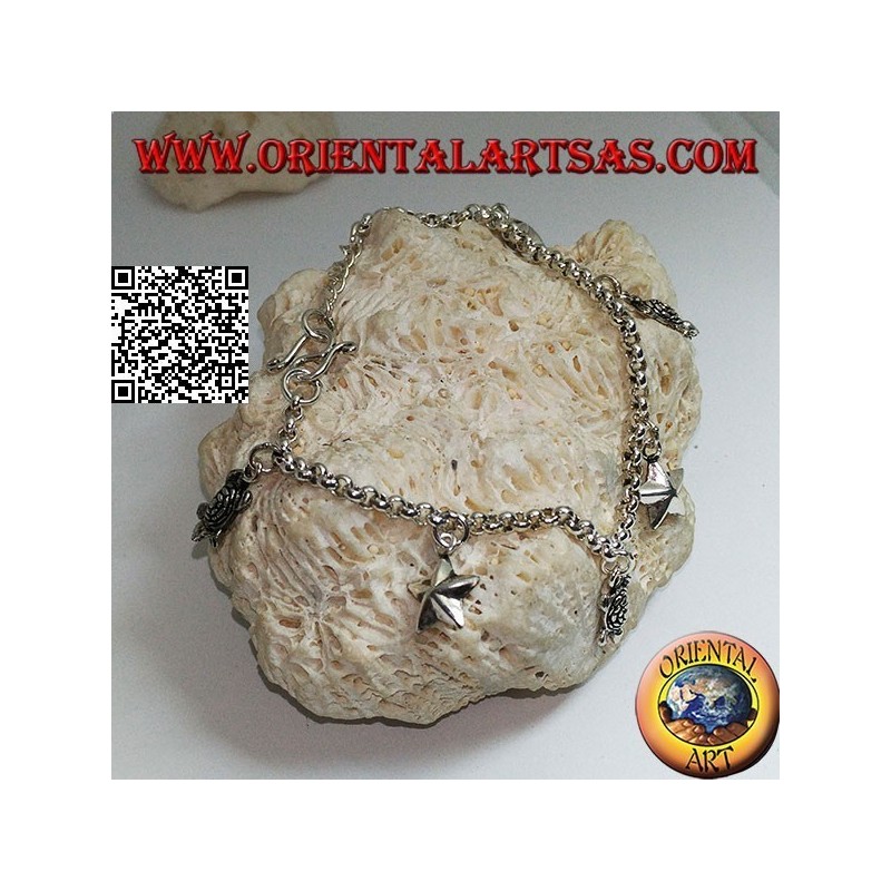 Soft silver chain bracelet with hanging stars and turtles
