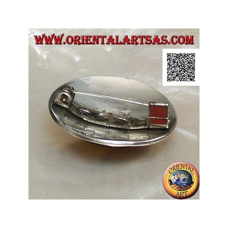 Spilla in argento con onice ovale grande cabochon contornata da dischetti e due fili di puntini