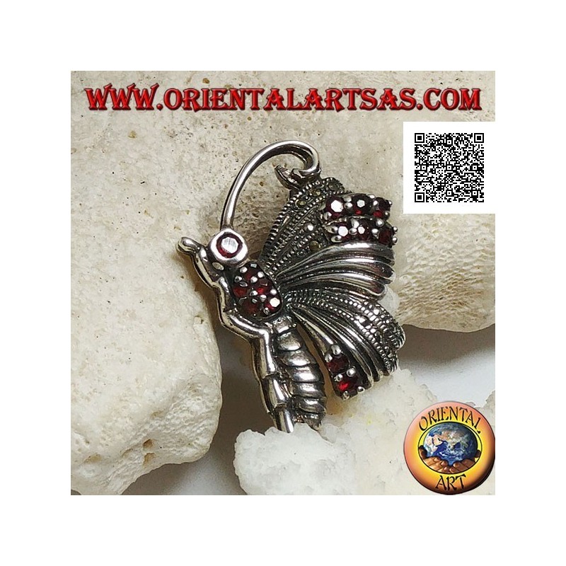 Broche de plata con forma de mariposa en perfil tachonado de marcasita y granates