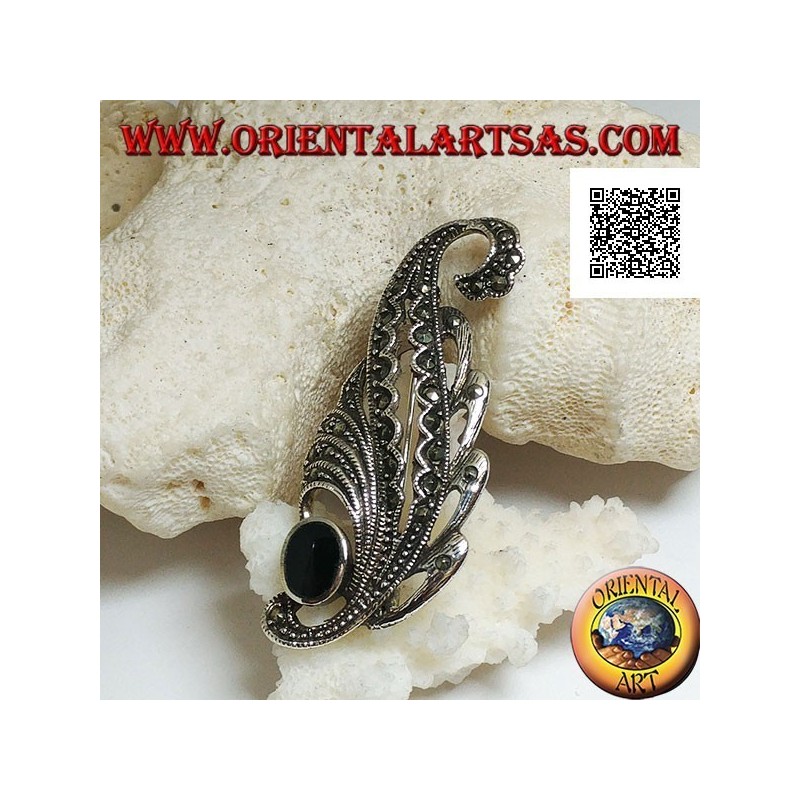 Silver brooch in the shape of a leaf studded with marcasite and with oval onyx