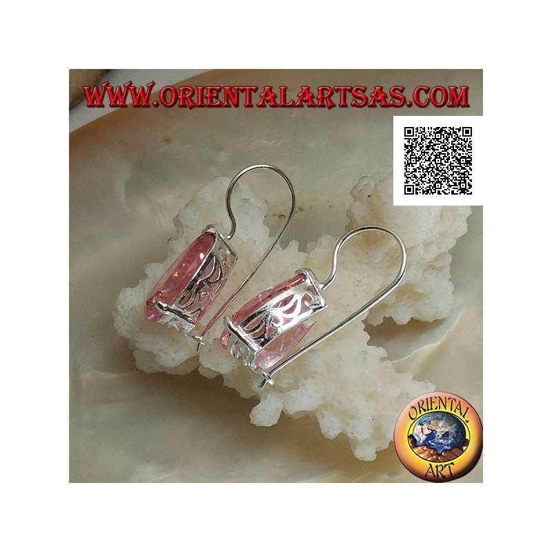 Dangling silver earrings with pink teardrop zircon set on a frame with lateral openings