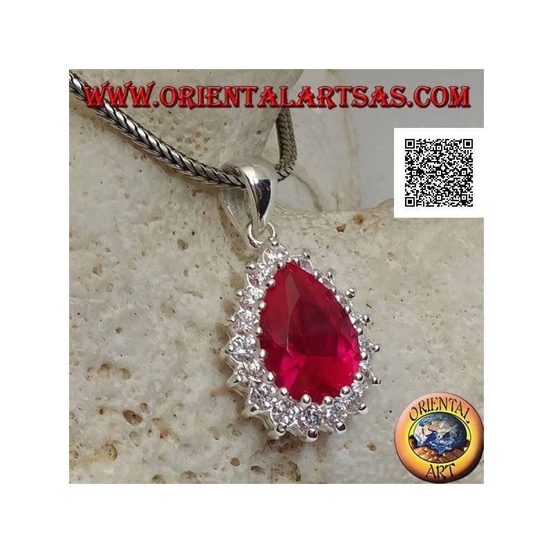 Silver pendant with drop-shaped ruby-colored zircon surrounded by white zircons