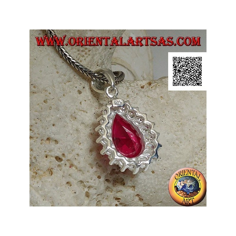 Silver pendant with drop-shaped ruby-colored zircon surrounded by white zircons