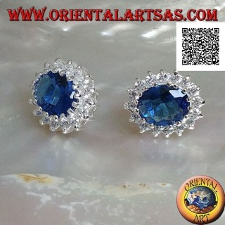 Silver earrings with oval sapphire zircon set surrounded by white zircons