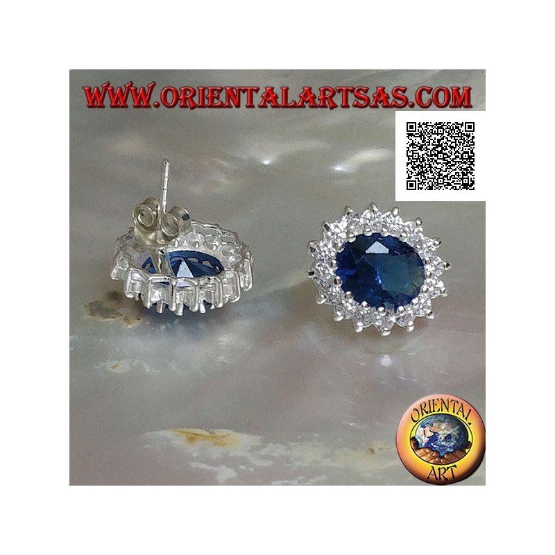 Silver earrings with oval sapphire zircon set surrounded by white zircons