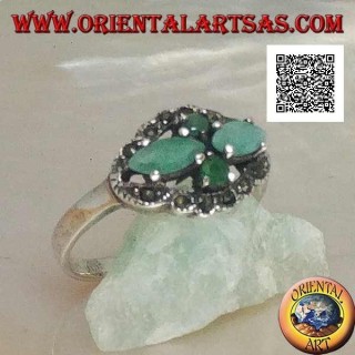 Silver ring with crossed cross pairs of natural shuttle emeralds and round ones surrounded by marcasite