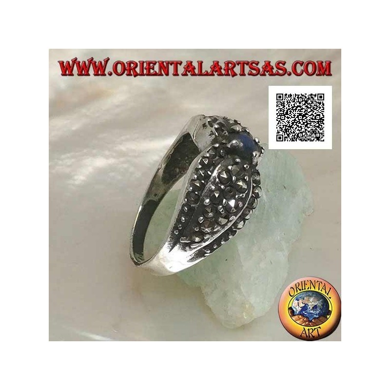Silver ring with natural round lapis lazuli in the center between two drops studded with marcasite