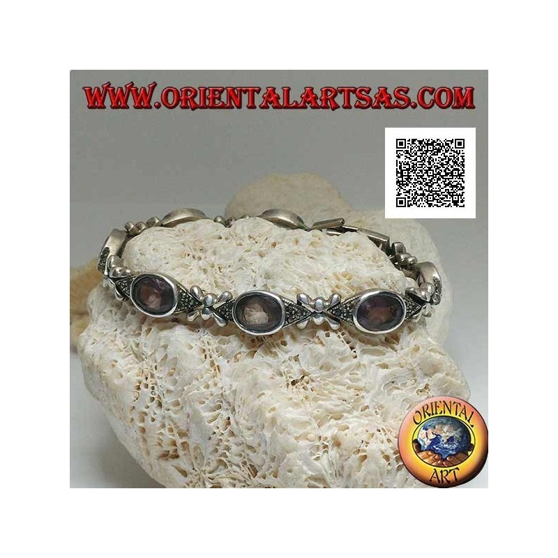 Bracciale in argento con 7 navette di marcassite con ametista ovale naturale centrale alternate a crocette d'argento