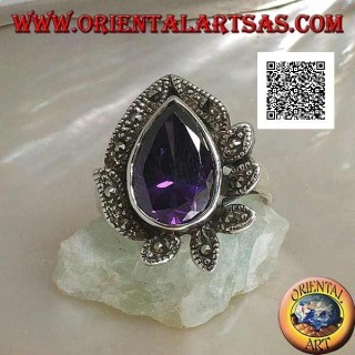 Silver ring with large drop amethyst colored zircon surrounded by leaves studded with marcasite