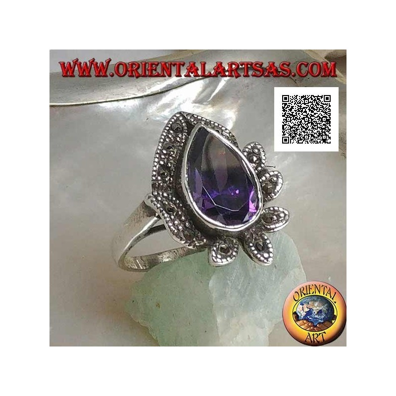 Silver ring with large drop amethyst colored zircon surrounded by leaves studded with marcasite