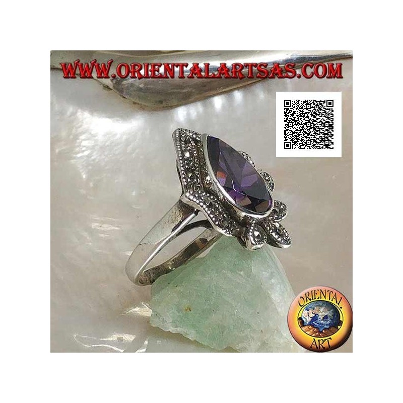 Anillo de plata con una gran gota de circón color amatista rodeado de hojas tachonadas de marcasita