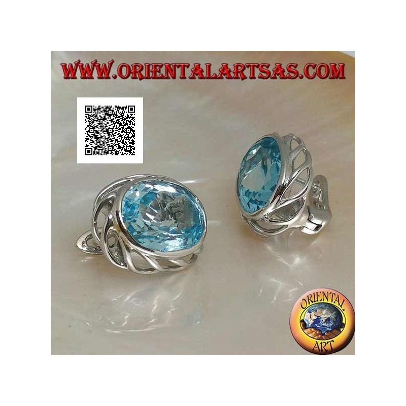 Silver lobe earrings with blue oval topaz on with openwork weave on the sides and lever closure