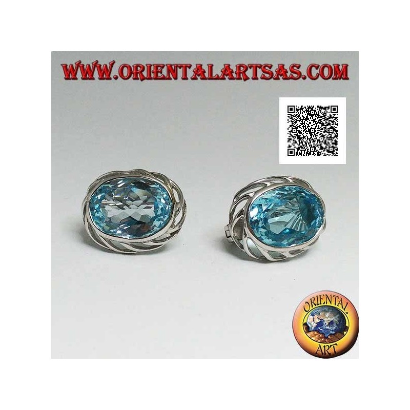 Silver lobe earrings with blue oval topaz on with openwork weave on the sides and lever closure