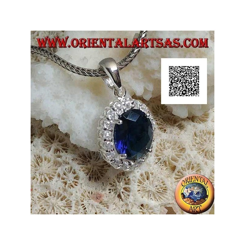 Silver pendant with oval sapphire zircon set surrounded by white zircons