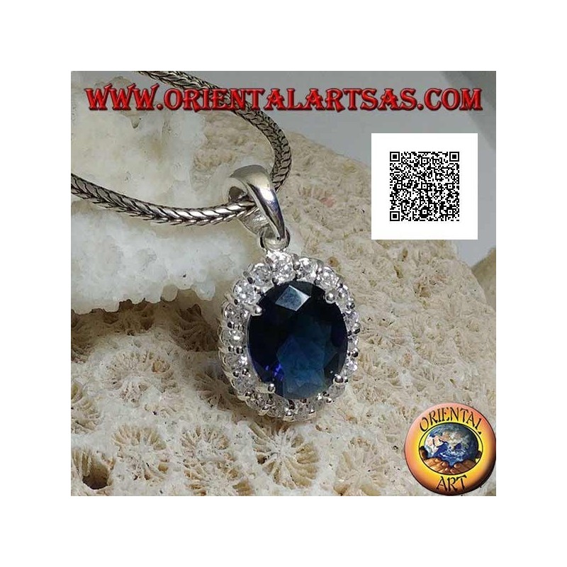 Silver pendant with oval sapphire zircon set surrounded by white zircons