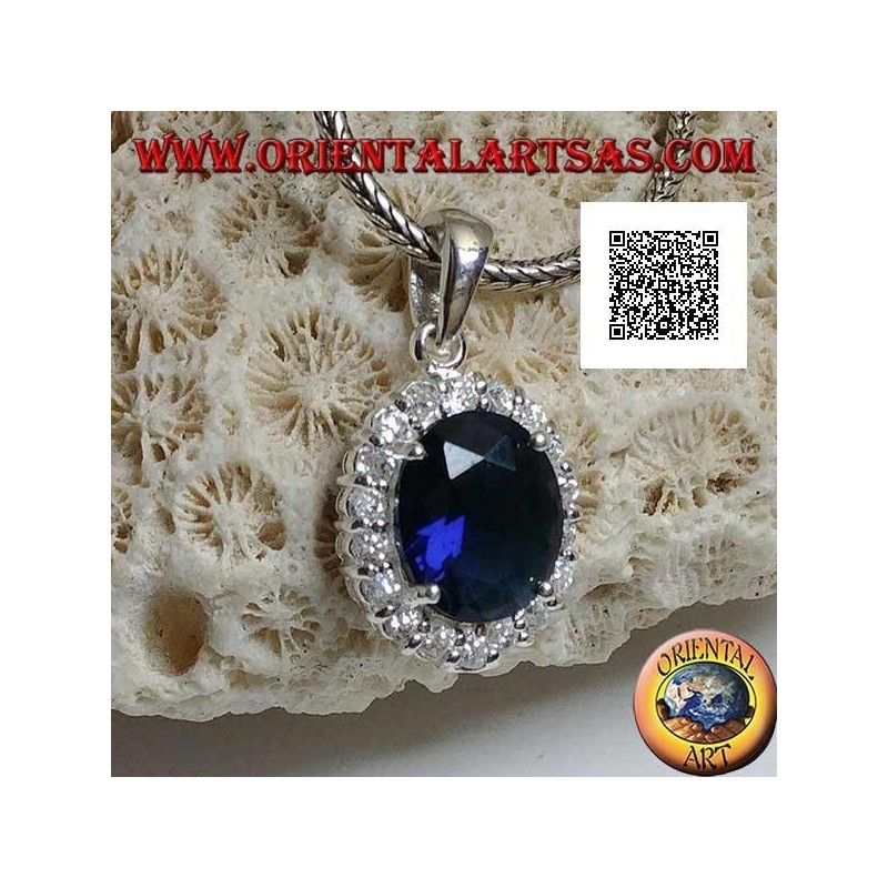 Silver pendant with oval sapphire zircon set surrounded by white zircons