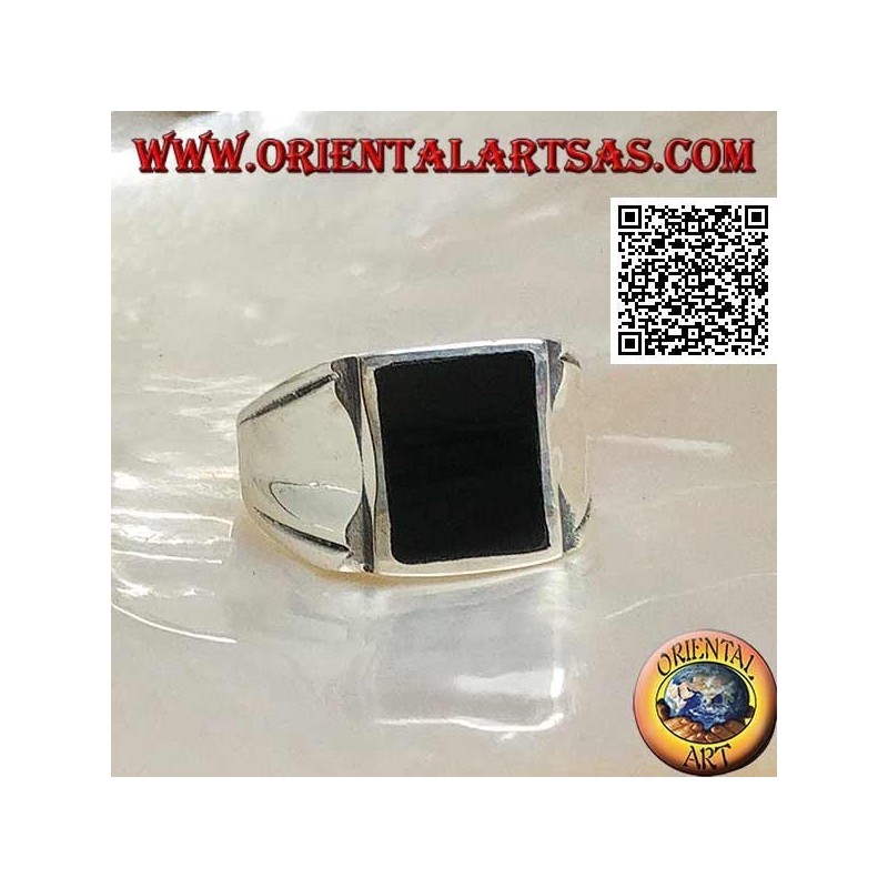 Silver ring with rectangular onyx on a smooth frame with central hollow on the sides