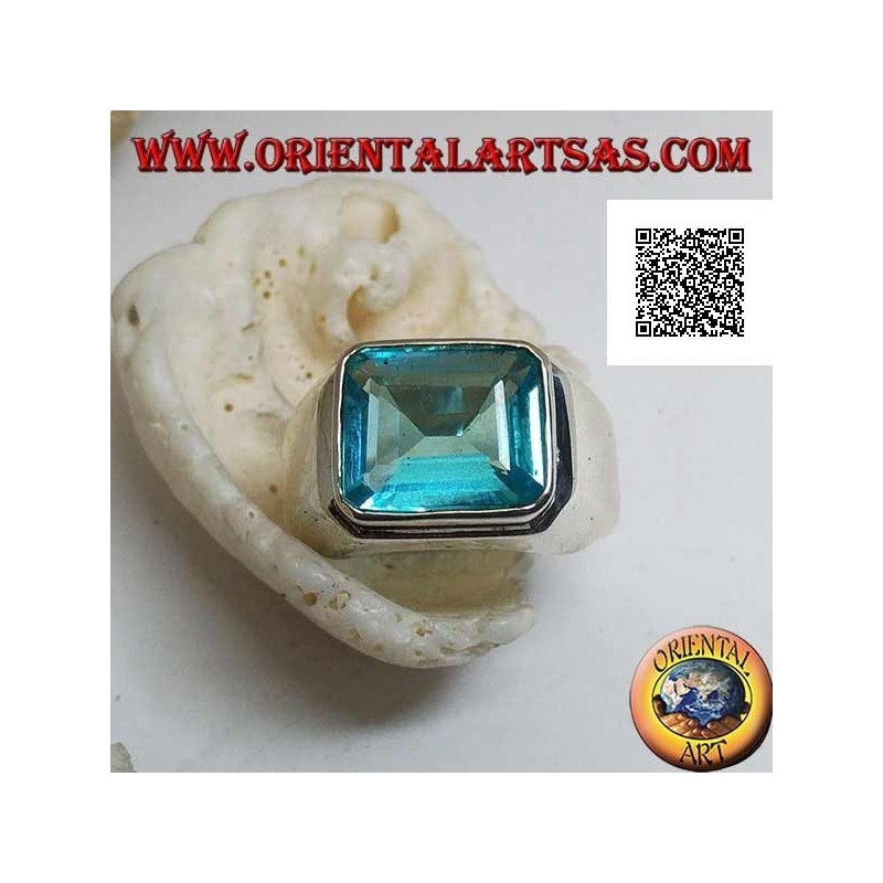 Silver ring with rectangular horizontal blue topaz raised on a smooth frame