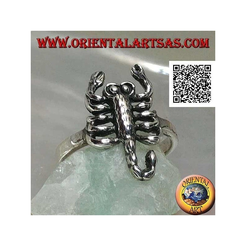 Silver ring with scorpion in an offensive position