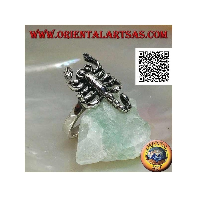 Silver ring with scorpion in an offensive position