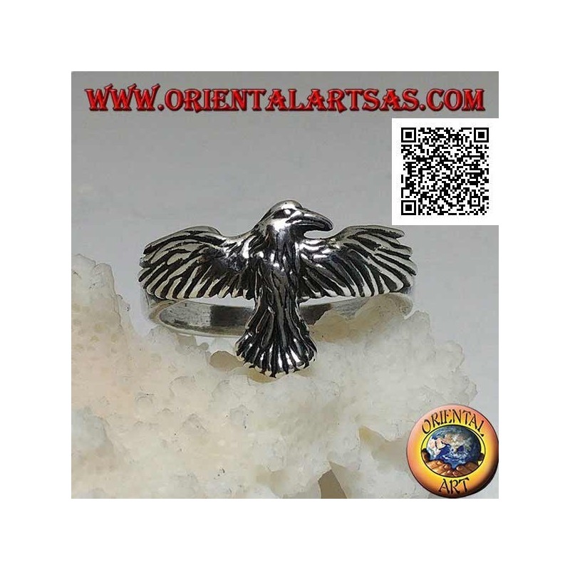 Silver ring with phoenix with spread and spread wings in flight