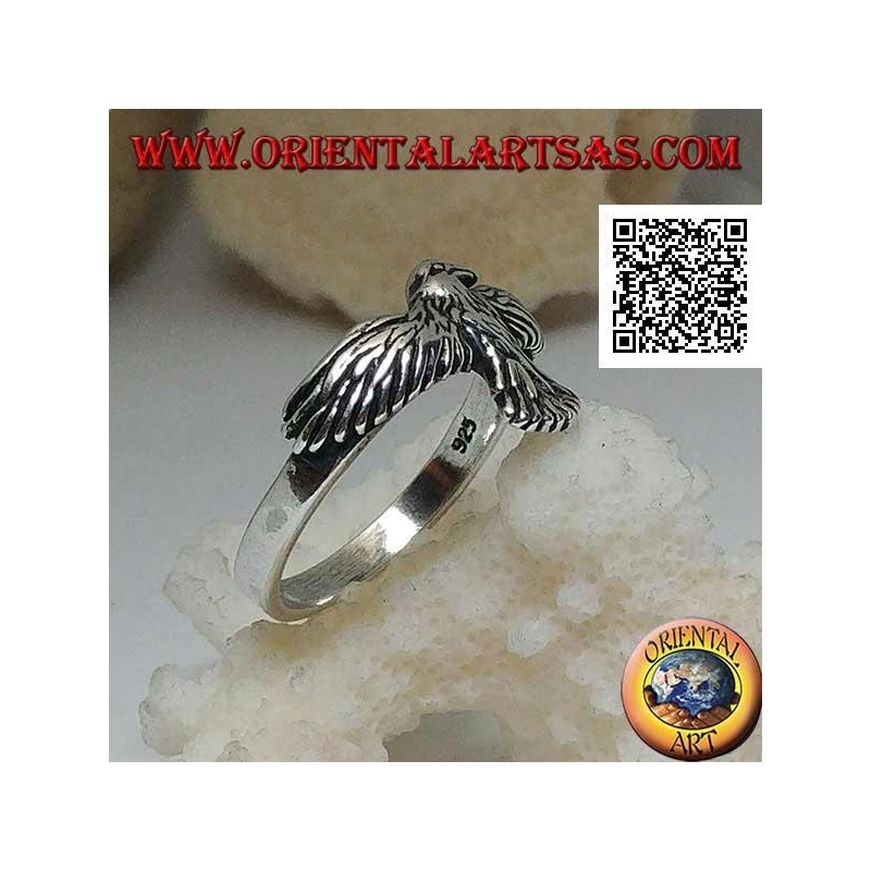 Anillo de plata con fénix con alas desplegadas y extendidas en vuelo
