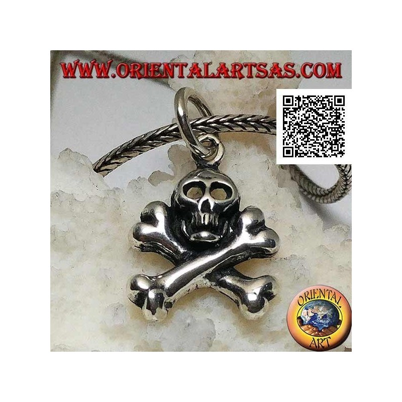 Silver skull pendant with two crossed femoral bones underneath