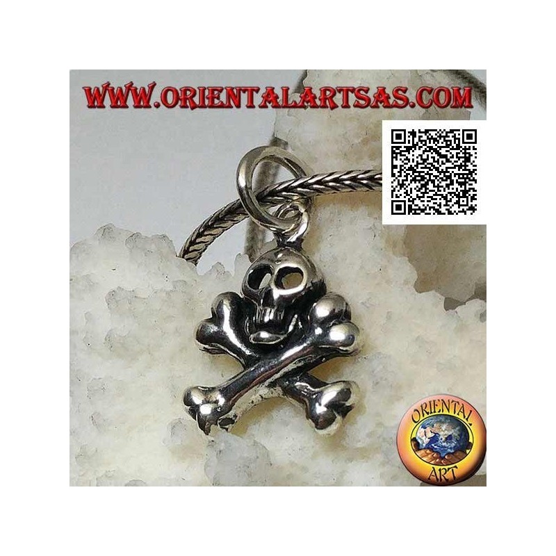 Silver skull pendant with two crossed femoral bones underneath