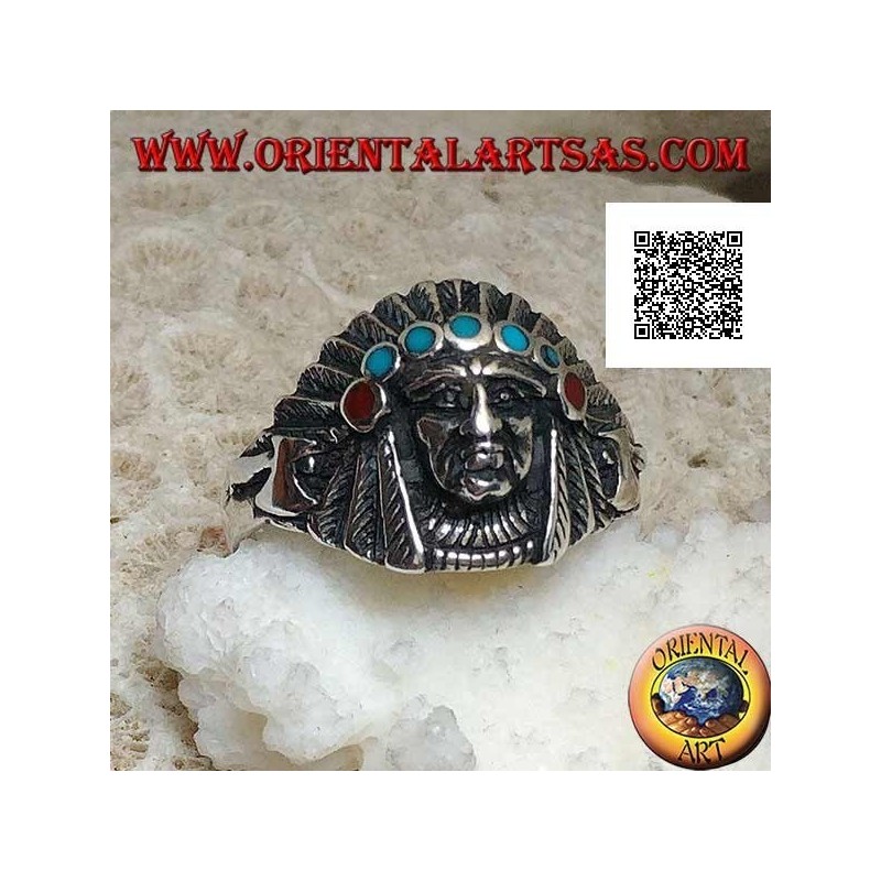Anello in argento, testa di di un Indiano nativo d'America con copricapo di piume e dischetti di turchese e corallo