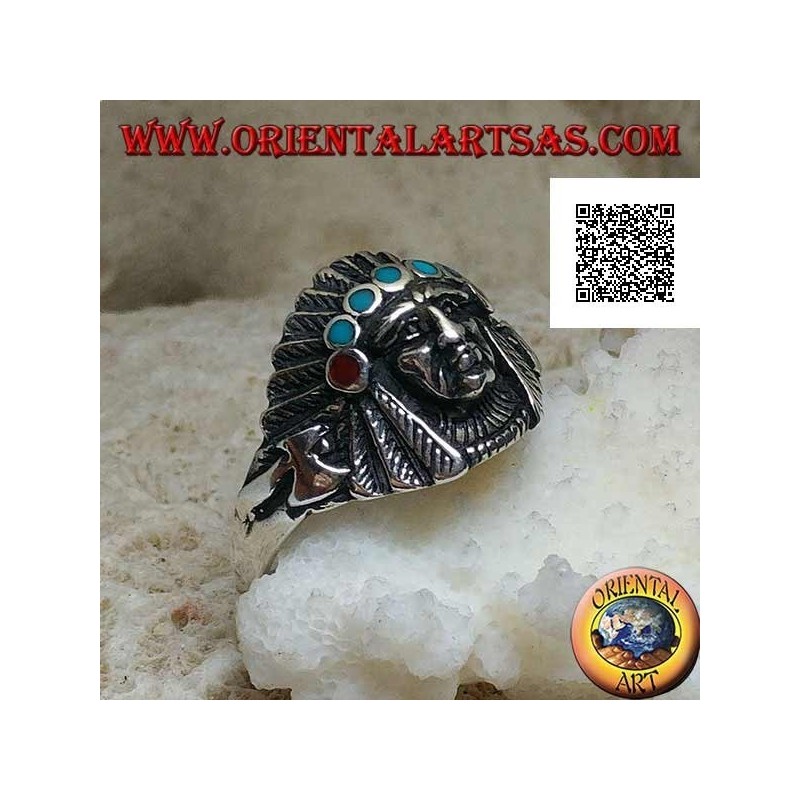 Anillo de plata, cabeza de indio americano con tocado de plumas y discos de turquesa y coral