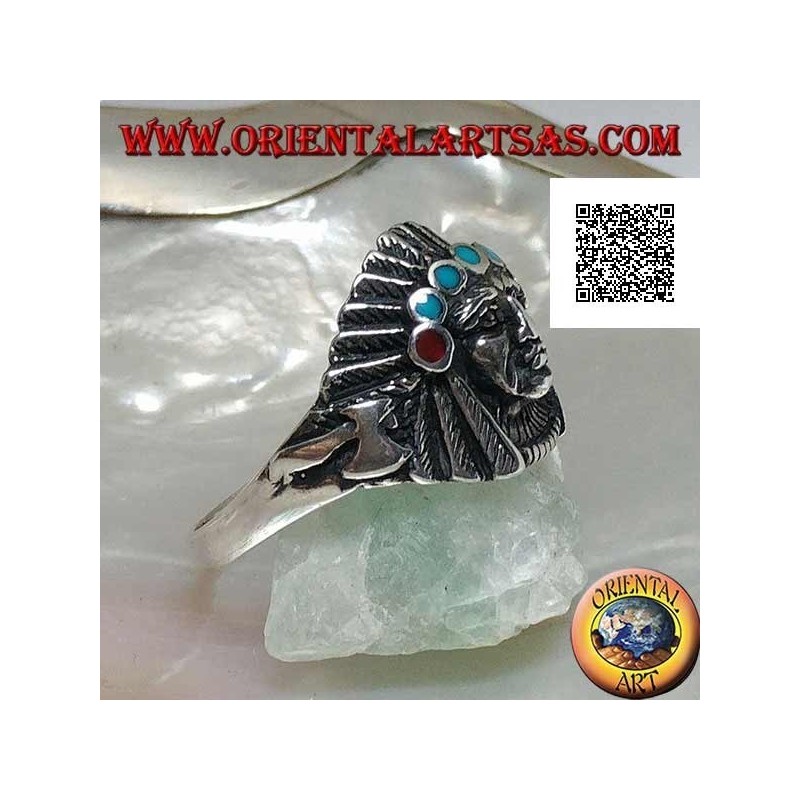 Anello in argento, testa di di un Indiano nativo d'America con copricapo di piume e dischetti di turchese e corallo