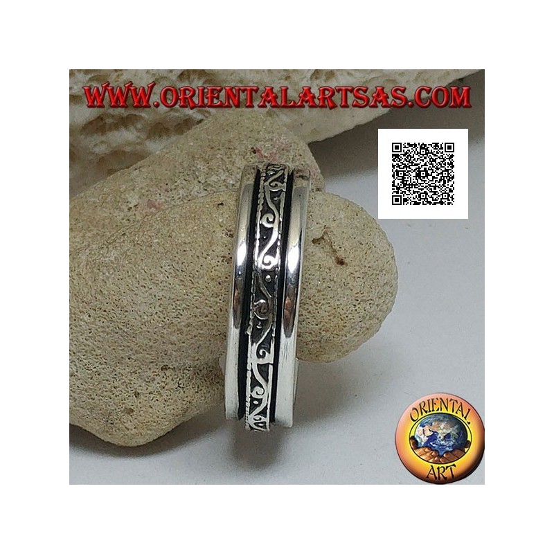 Anello in argento a fedina girevole con onda e spirali in bassorilievo