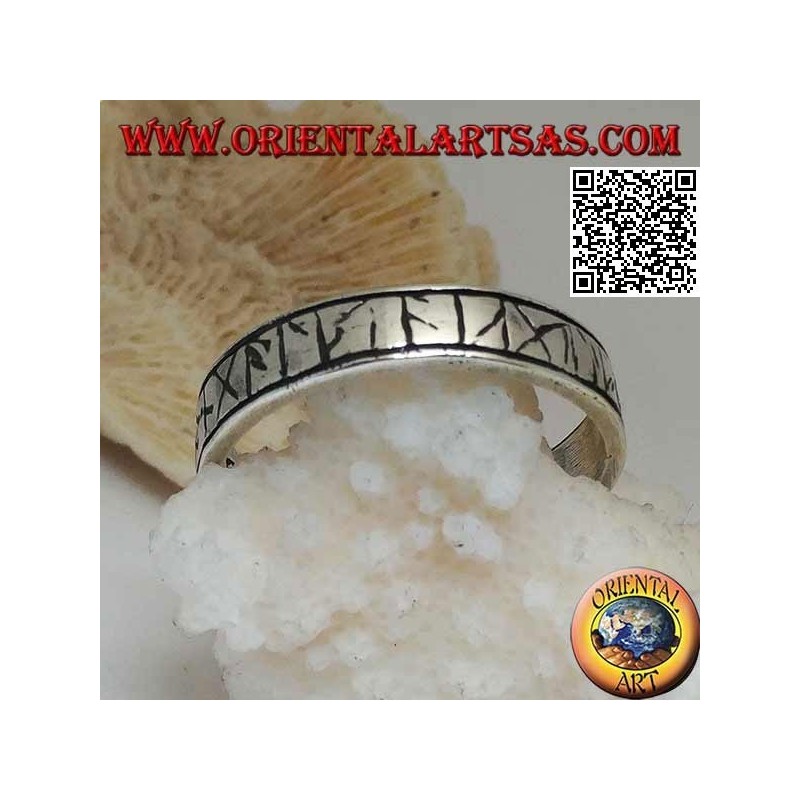 Silver ring with engraved Celtic runes