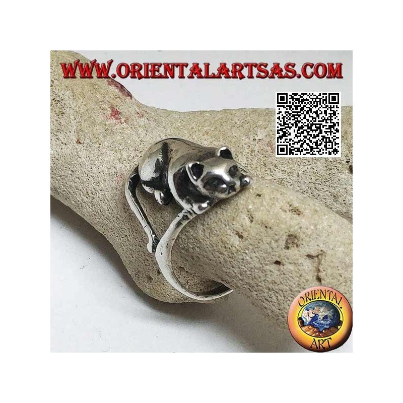 Silver ring with cat lying in an offensive position ready to jump