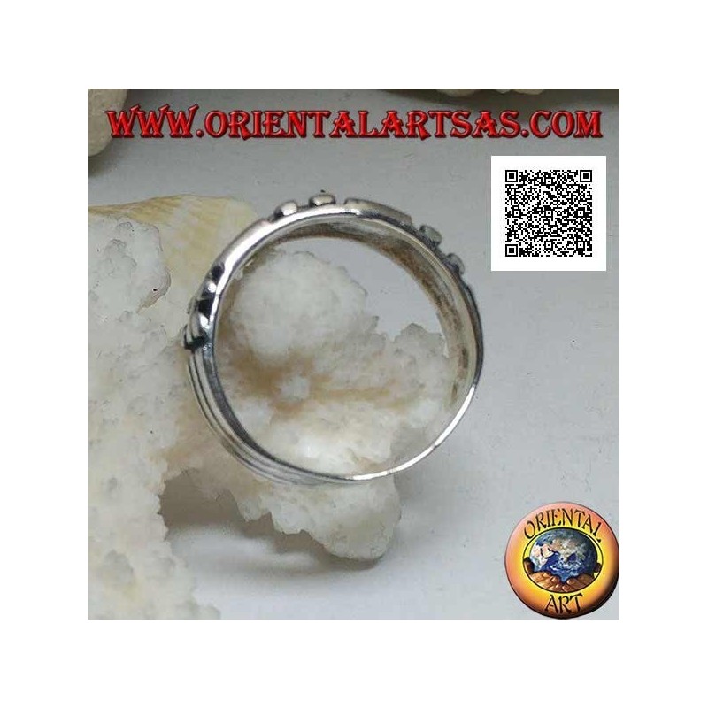 Silver ring with rectangles and pairs of checkerboard circles in bas-relief