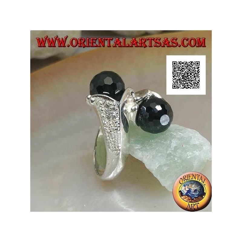 Two-arm rhodium silver ring with two faceted spinel zircon spheres