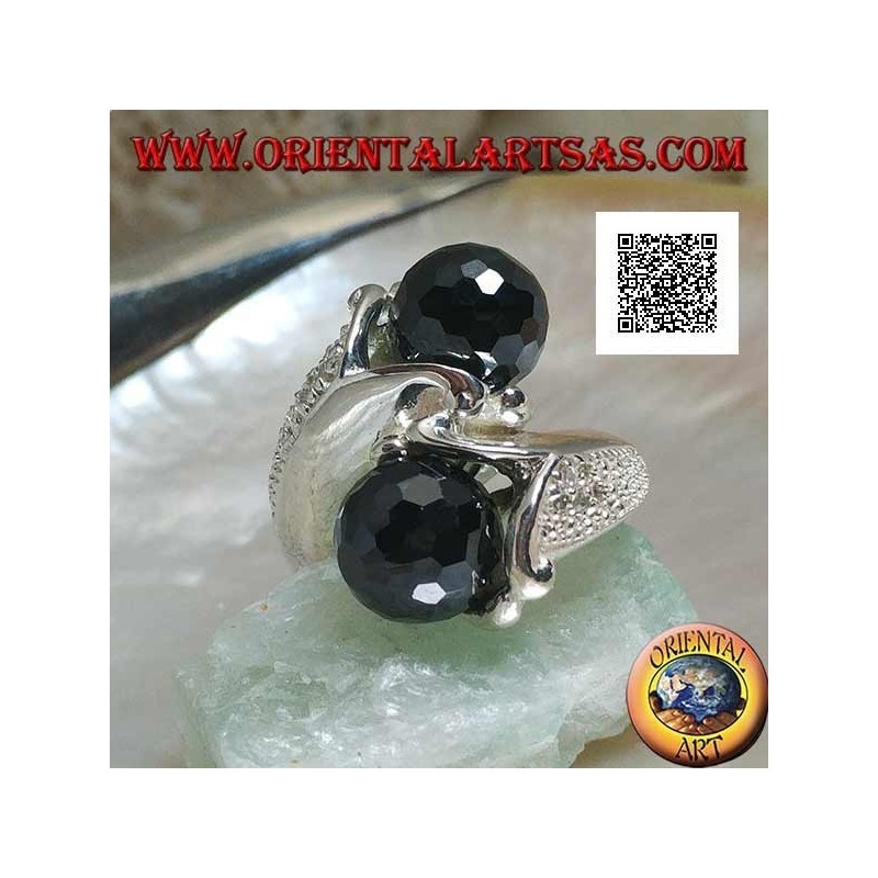Two-arm rhodium silver ring with two faceted spinel zircon spheres