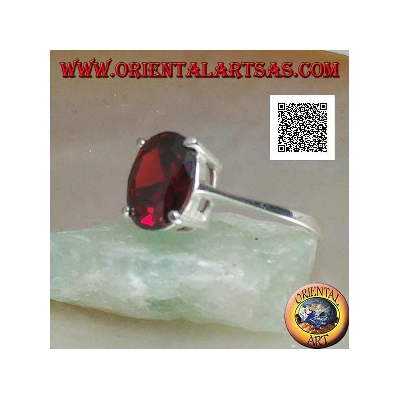 Rhodium silver ring with faceted oval cabochon garnet set with 4 clips