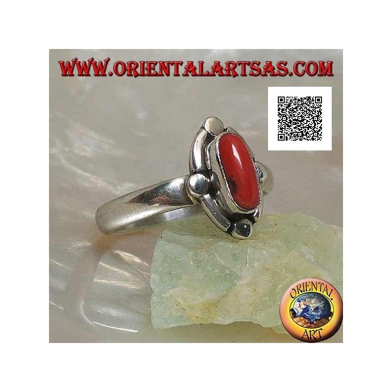 Silver ring with oval natural coral surrounded by alternating bands and discs