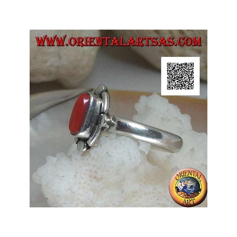 Anillo de plata con coral natural ovalado rodeado de bandas y discos alternados