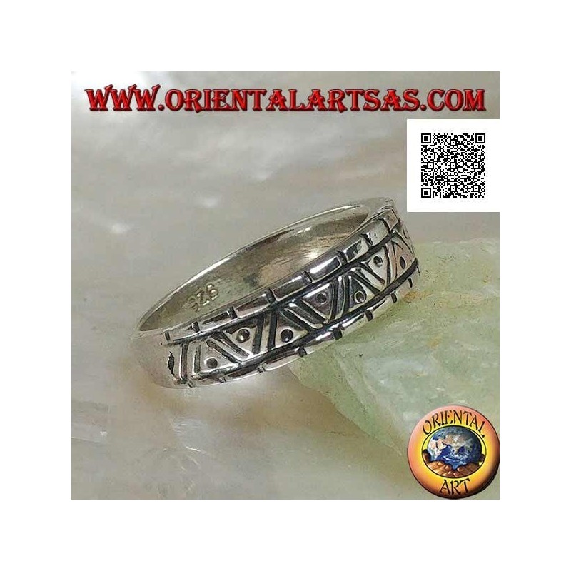 Silver ring with engravings of various geometric shapes