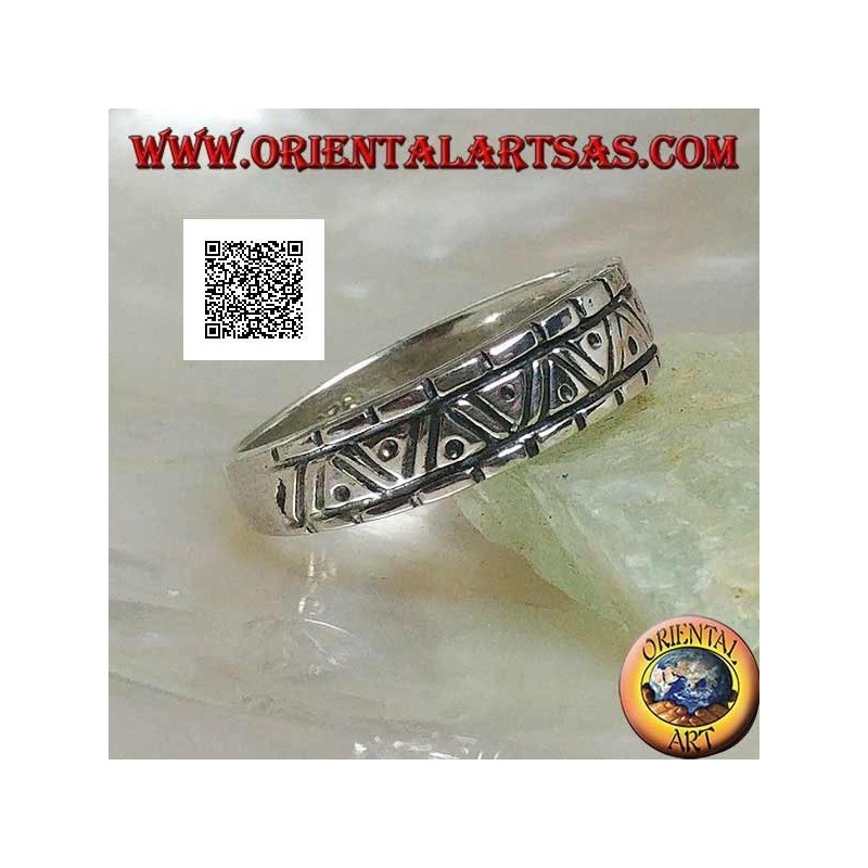 Silver ring with engravings of various geometric shapes