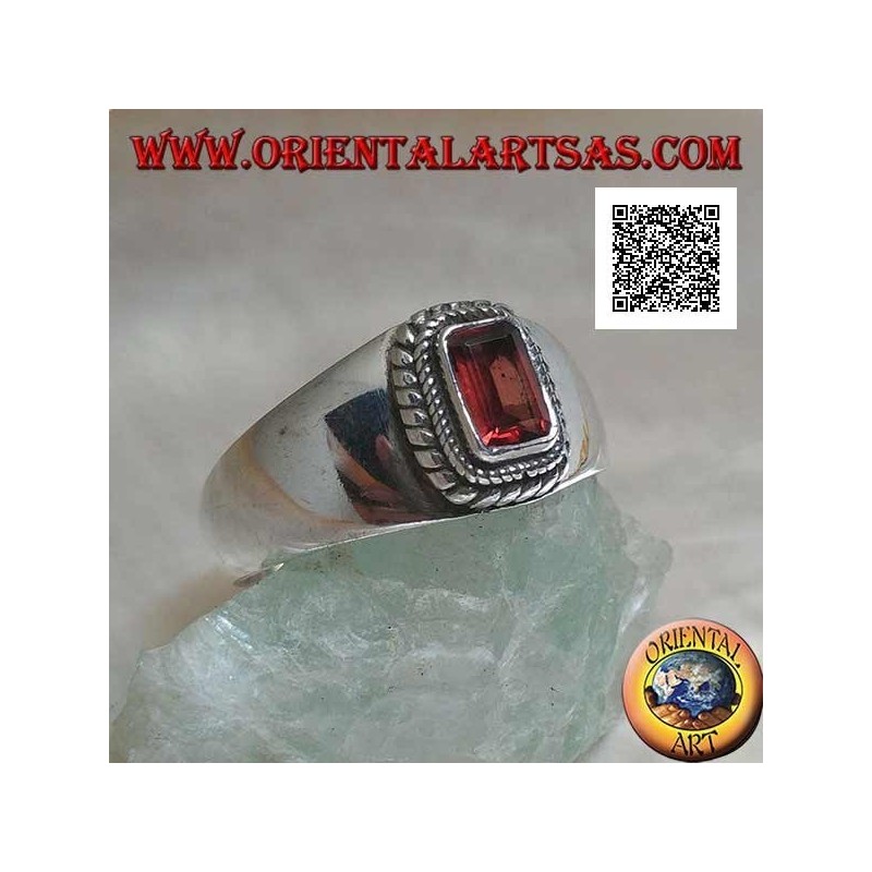 Silver ring with raised rectangular natural garnet surrounded by a double weave