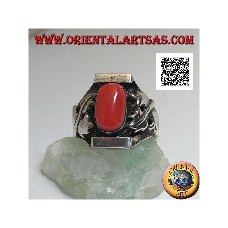 Silver ring with oval antique Tibetan coral in Nepalese setting with maple leaf on the sides