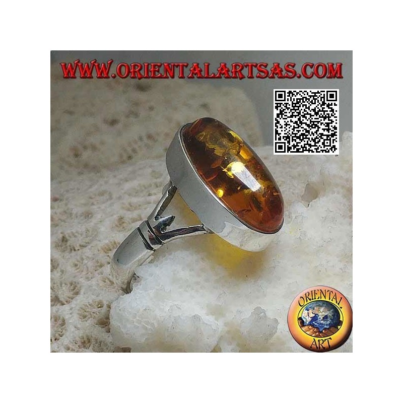 Anillo de plata con un ámbar cabujón ovalado alargado unido a dos