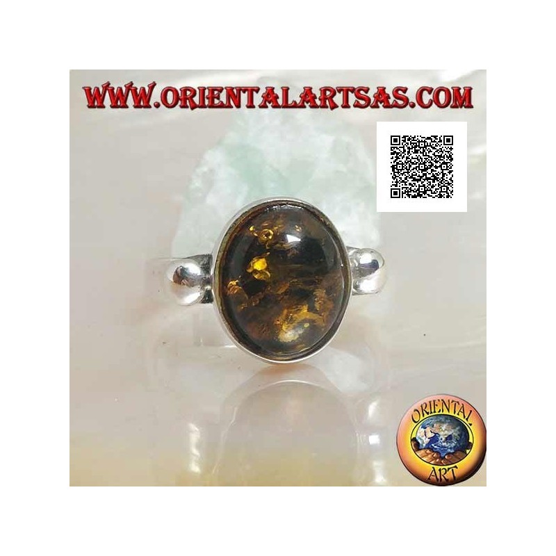 Silver ring with oval green cabochon amber with side ball on smooth setting