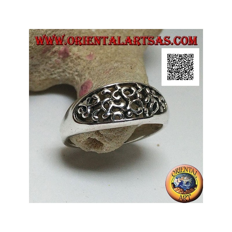 Silver ring with dense openwork decoration on a horizontal oval