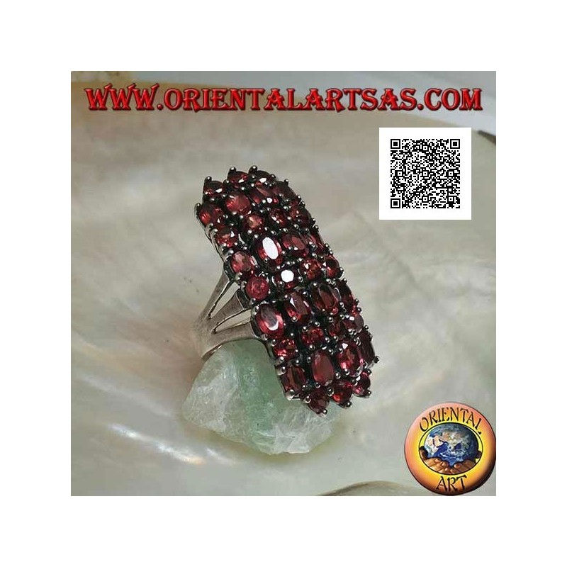 Silver ring with 31 natural garnets set oval and round to form a rectangle