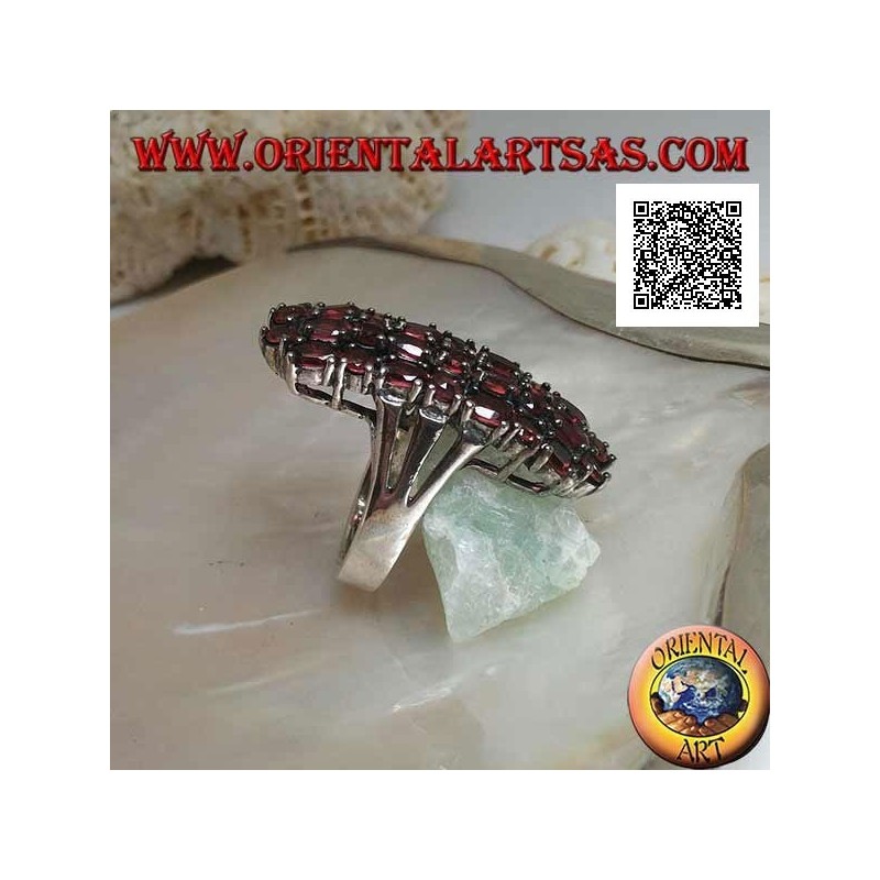 Silver ring with 31 natural garnets set oval and round to form a rectangle